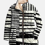 Véronique | Gesteppte Jacke mit grafischen Streifen – Schwarz-weisse Streifen